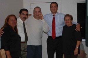 Client with his legal team, being reunited with his family after 9 months in jail  
